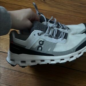 On Running White and Black Sneakers